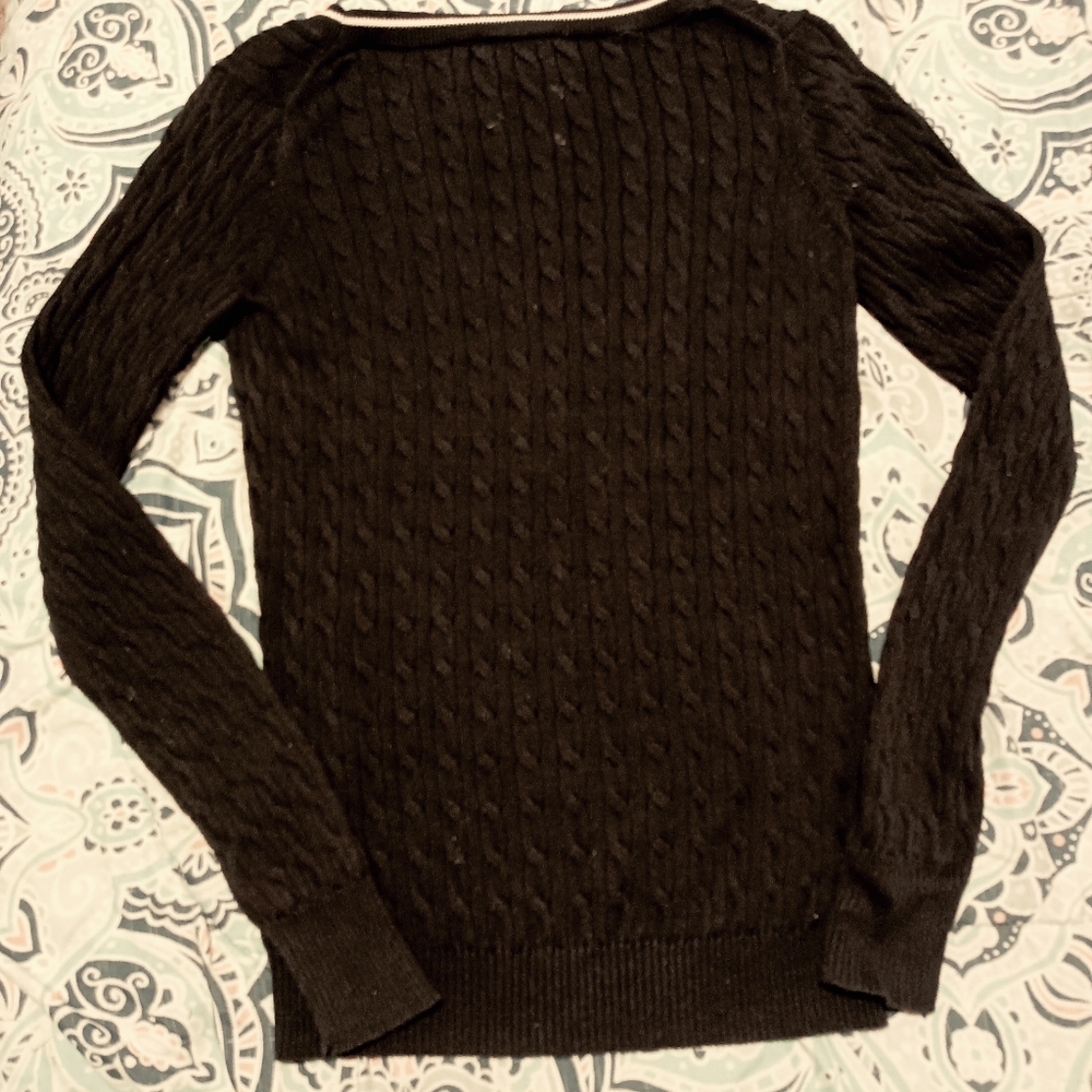 Lacoste Women's Navy Scoop neck Sweater. This white stripe along the neckline.